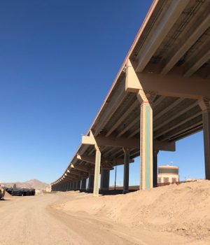 A view of an overpass from the side.